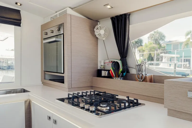 Slide: The Image of Modern kitchen interior of 2020 Fountaine Pajot Saona 47 catamaran with stove and oven. - 45