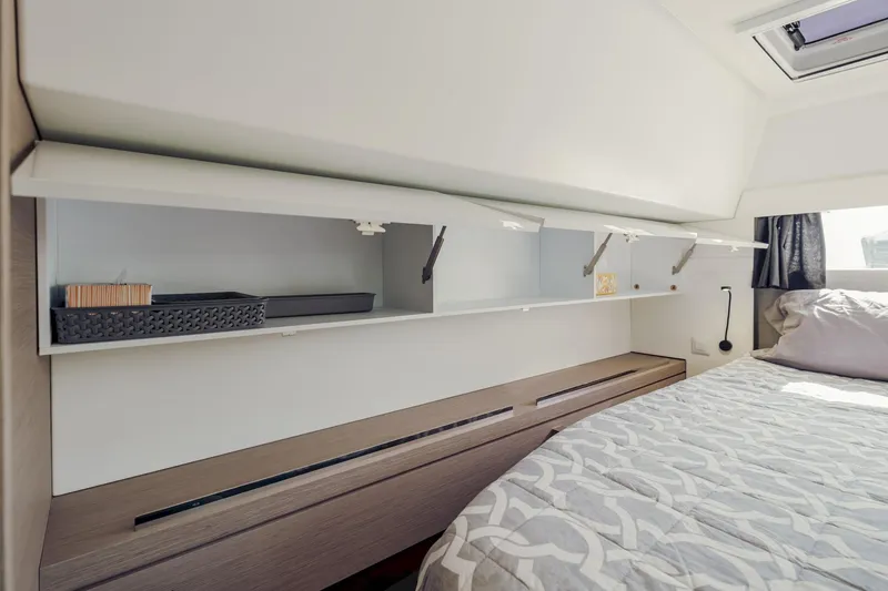 Slide: The Image of Interior cabin of 2020 Fountaine Pajot Saona 47 catamaran with storage and bed. - 49