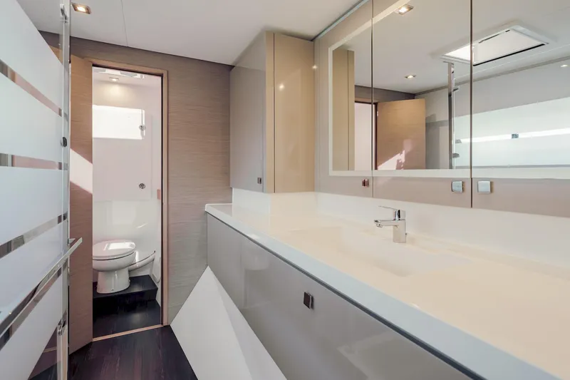 Slide: The Image of Luxurious bathroom interior of 2020 Fountaine Pajot Saona 47 catamaran, featuring modern fixtures and sleek design. - 55