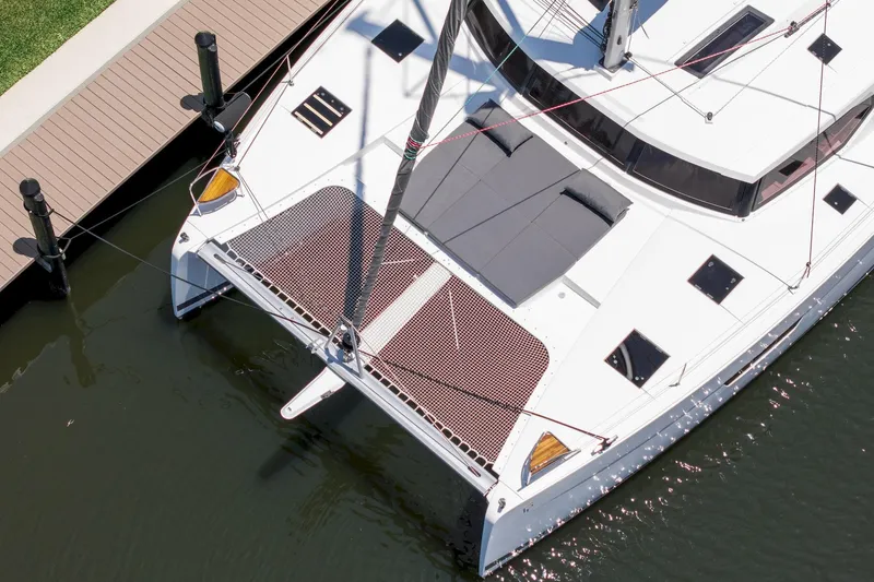 Slide: The Image of Aerial view of 2020 Fountaine Pajot Saona 47 catamaran docked at marina. - 6