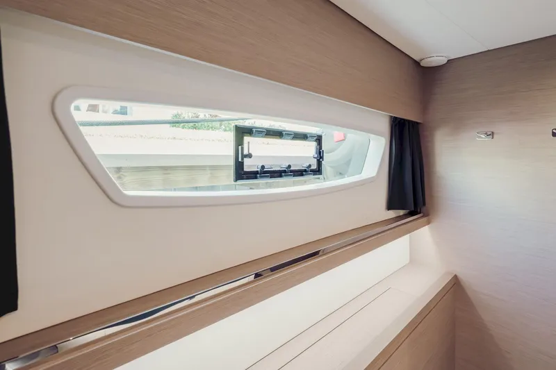 Slide: The Image of Interior view of 2020 Fountaine Pajot Saona 47 yacht cabin window. - 61