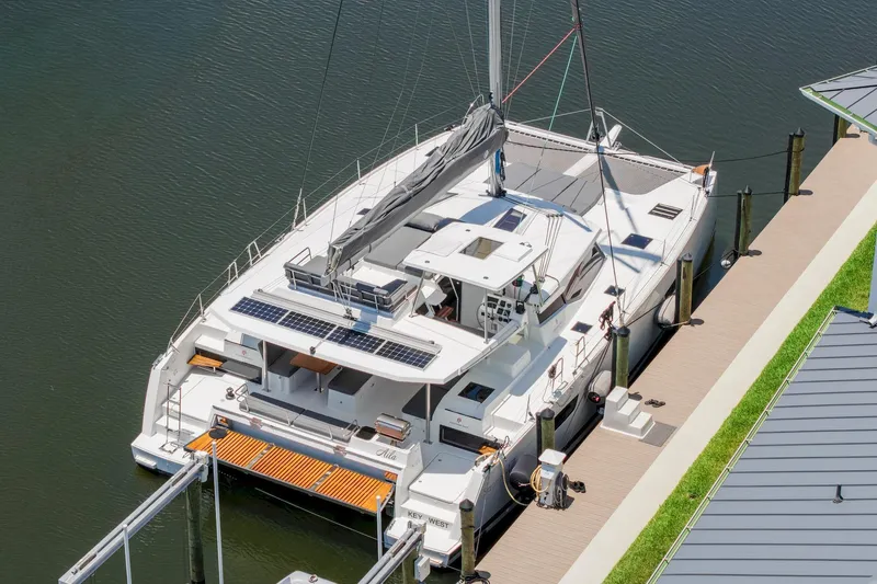 Slide: The Image of 2020 Fountaine Pajot Saona 47 catamaran docked at marina, aerial view. - 7