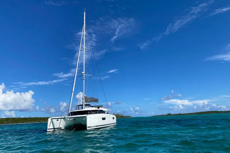 Slide: The Image of 2020 Fountaine Pajot Saona 47 catamaran sailing on clear blue waters under a bright sky. - 75