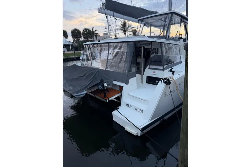 Slide: The Image of 2020 Fountaine Pajot Saona 47 catamaran docked at Key West marina. - 77