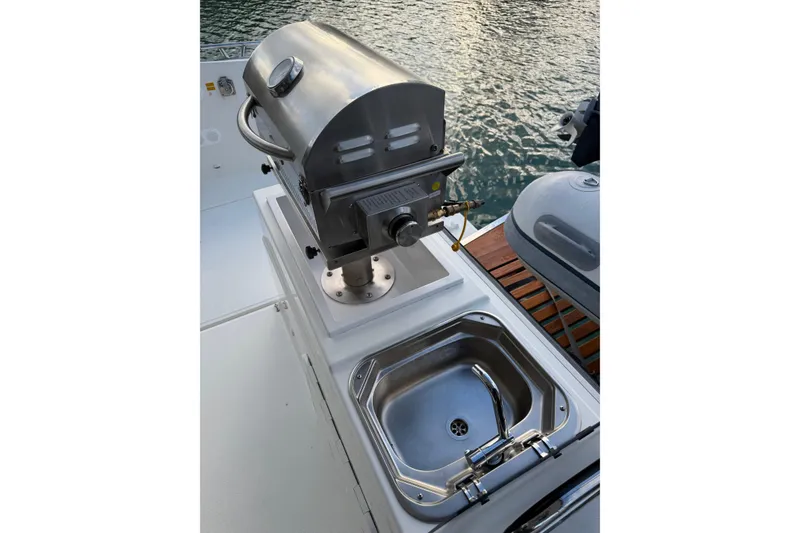 Slide: The Image of Outdoor grill and sink on 2020 Fountaine Pajot Saona 47 yacht deck. - 82