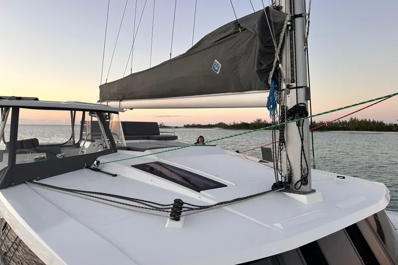 Slide: The Image of 2020 Fountaine Pajot Saona 47 catamaran sailing at sunset on calm waters. - 84