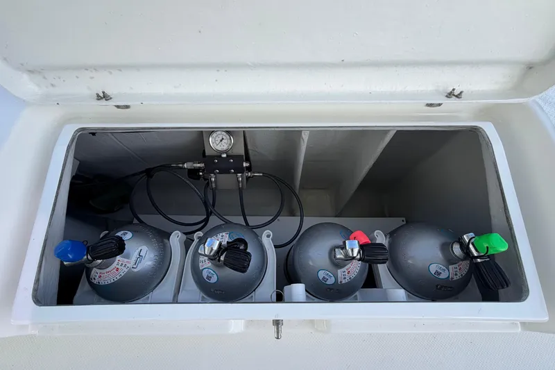 Slide: The Image of Storage compartment with gas cylinders on a 2020 Fountaine Pajot Saona 47 yacht. - 87