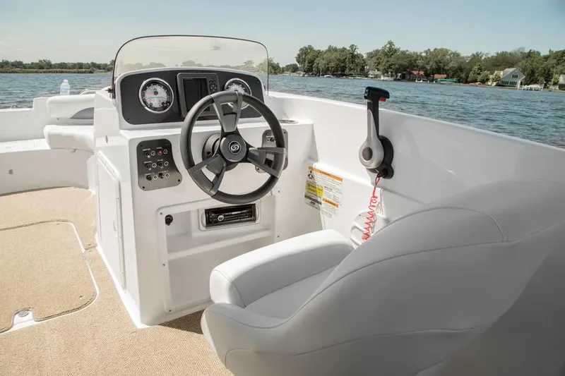 Slide: The Image of Manufacturer Provided Image: 2014 Hurricane SunDeck Sport 188 OB boat cockpit with steering wheel and controls. - 6
