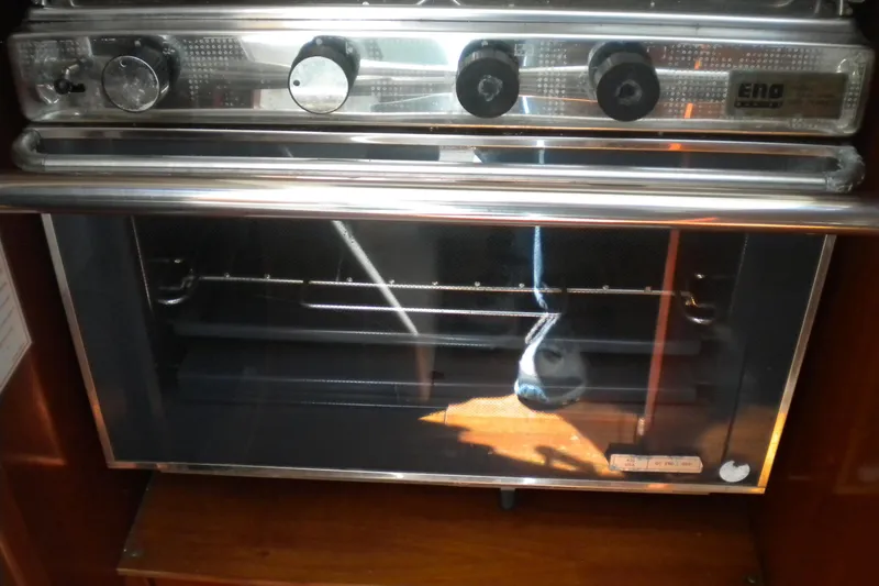 Slide: The Image of Stainless steel oven in a 1994 Beneteau First 310 yacht kitchen. - 19
