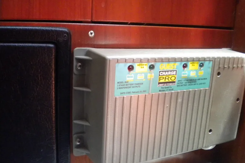 Slide: The Image of Battery charger inside a 1994 Beneteau First 310 sailboat cabin. - 22