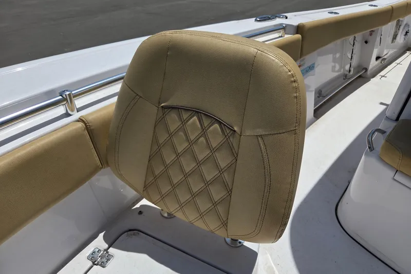 Slide: The Image of 2025 Sportsman Open 262 Center Console boat seat with diamond-stitched upholstery. - 17