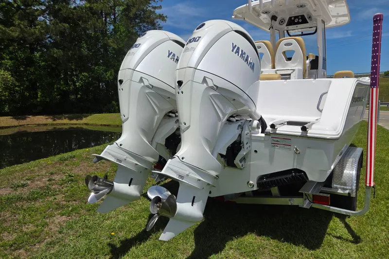 Slide: The Image of 2025 Sportsman Open 262 Center Console with dual Yamaha outboard motors. - 3