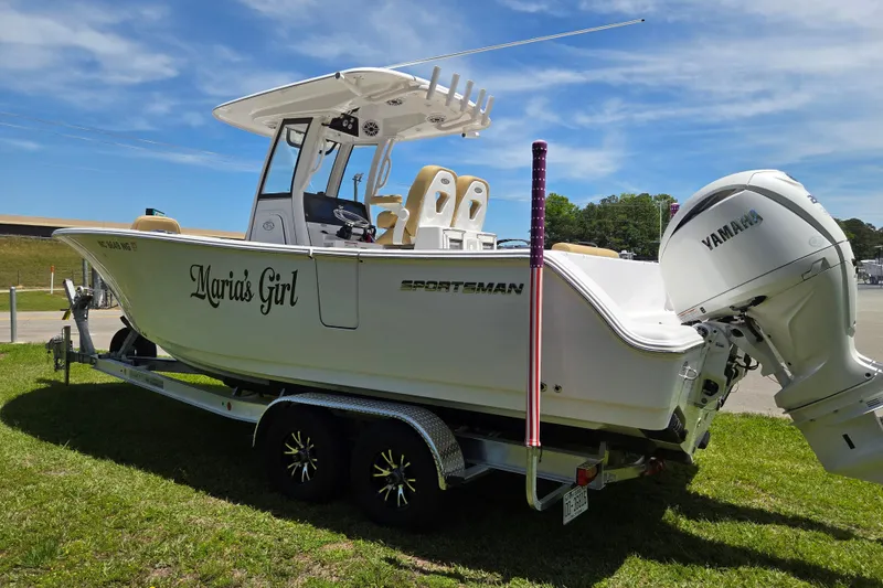 Slide: The Image of 2025 Sportsman Open 262 Center Console boat on trailer, named "Maria's Girl," with Yamaha engine. - 5