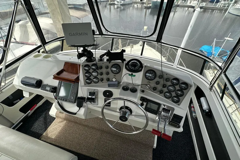 Slide: The Image of Cockpit of 1997 Carver 355 Aft Cabin Motor Yacht with Garmin navigation system. - 13