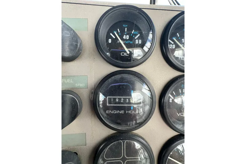 Slide: The Image of Instrument panel of a 1997 Carver 355 Aft Cabin Motor Yacht showing engine hours. - 16