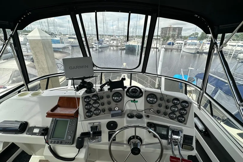 Slide: The Image of Cockpit view of 1997 Carver 355 Aft Cabin Motor Yacht with Garmin navigation system. - 17