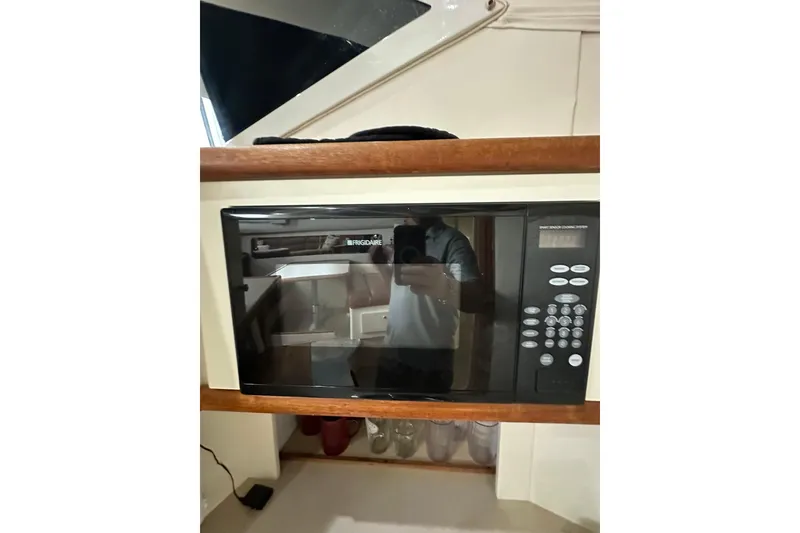 Slide: The Image of Frigidaire microwave in 1997 Carver 355 Aft Cabin Motor Yacht kitchen area. - 41