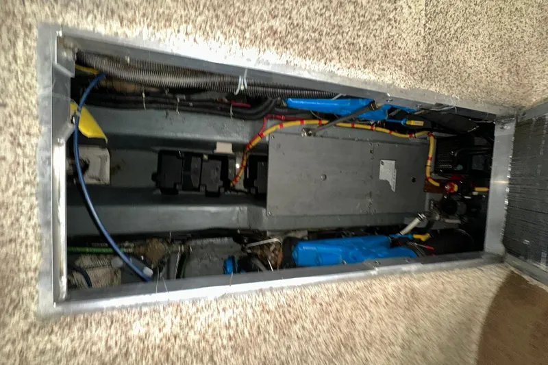Slide: The Image of Engine compartment of a 1997 Carver 355 Aft Cabin Motor Yacht, showcasing wiring and components. - 45