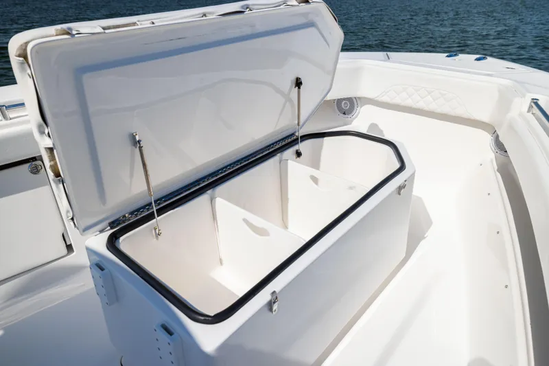 Slide: The Image of Open storage compartment on 2015 Invincible 39 Open Fisherman boat, showcasing spacious interior. - 20