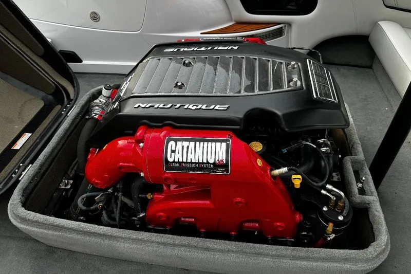 Slide: The Image of Engine of 2015 Nautique Ski Nautique 200 Open Bow boat, featuring Catanium clean emission system. - 6