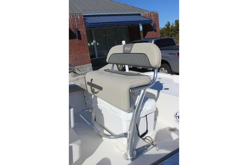 Slide: The Image of 2026 Key West 210 Bay Reef boat seat with stainless steel frame and cushioned backrest. - 10
