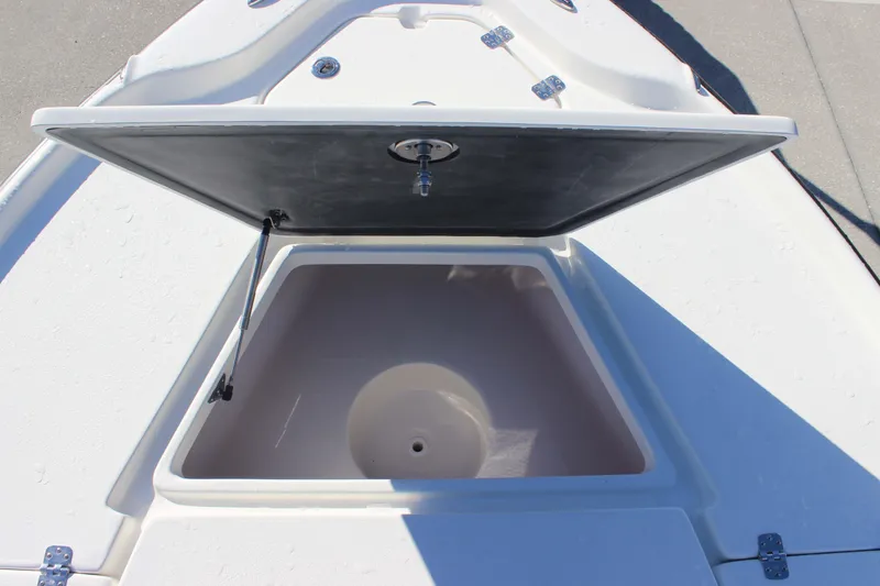 Slide: The Image of Open storage compartment on 2026 Key West 210 Bay Reef boat deck. - 13