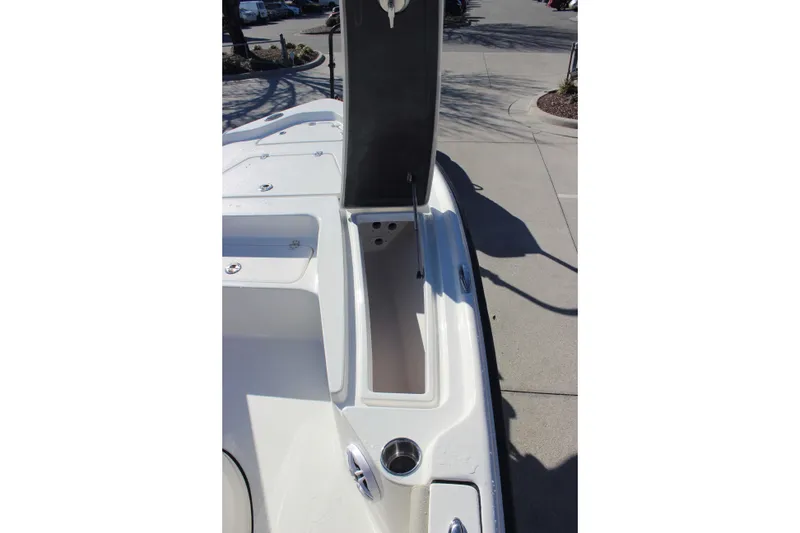 Slide: The Image of 2026 Key West 210 Bay Reef boat deck with open storage compartment. - 17