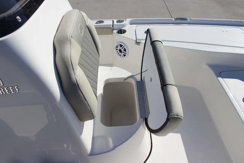 Slide: The Image of 2026 Key West 210 Bay Reef boat seat with storage compartment open. - 19