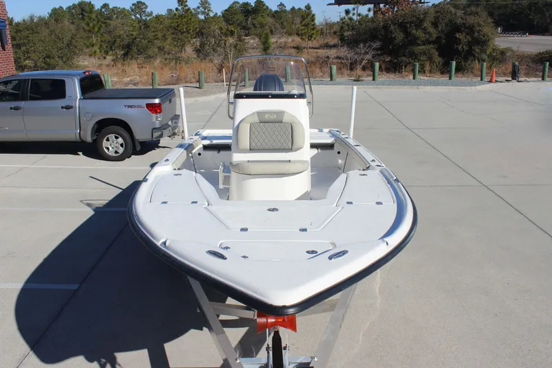 Slide: The Image of 2026 Key West 210 Bay Reef boat on trailer in parking lot. - 5