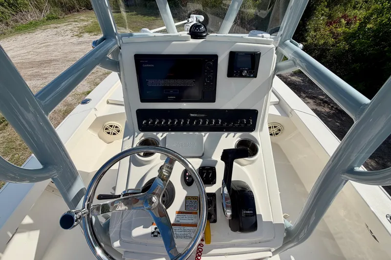 Slide: The Image of 2020 Pathfinder 2300 HPS boat console with Garmin display and Yamaha controls. - 8