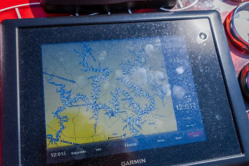Slide: The Image of Garmin GPS displaying a detailed map on a 2004 Outerlimits 42 Legacy boat. - 33