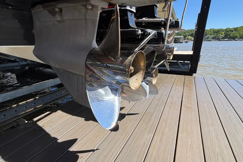 Slide: The Image of Propeller of 2004 Outerlimits 42 Legacy boat on dock, close-up view. - 64