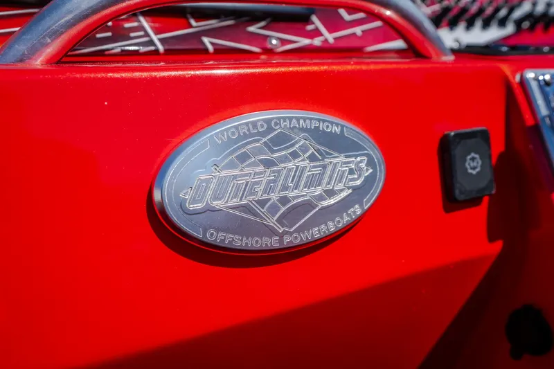 Slide: The Image of Red 2004 Outerlimits 42 Legacy powerboat with World Champion Offshore Powerboats emblem. - 28