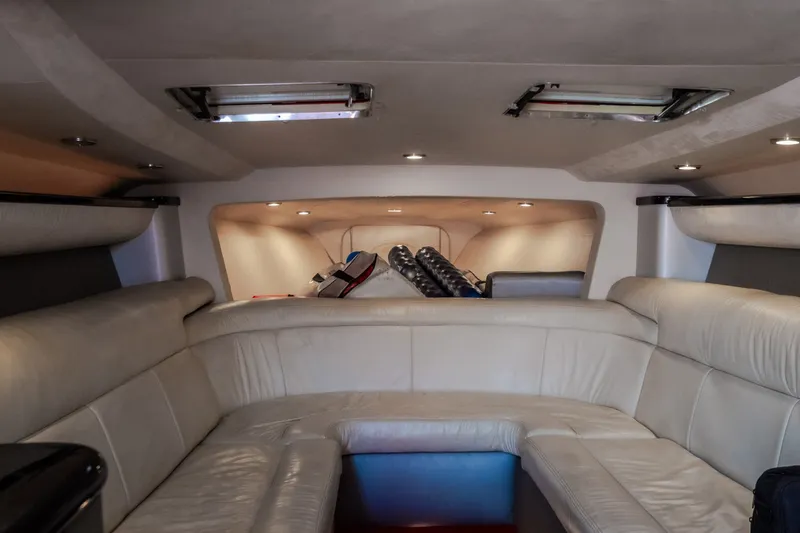 Slide: The Image of Luxurious interior of a 2004 Outerlimits 42 Legacy boat with plush seating. - 40