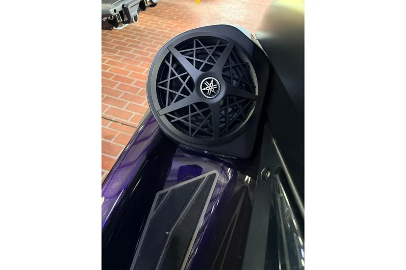 Slide: The Image of 2026 Yamaha WaveRunner FX SVHO speaker detail on a sleek, purple body. - 10