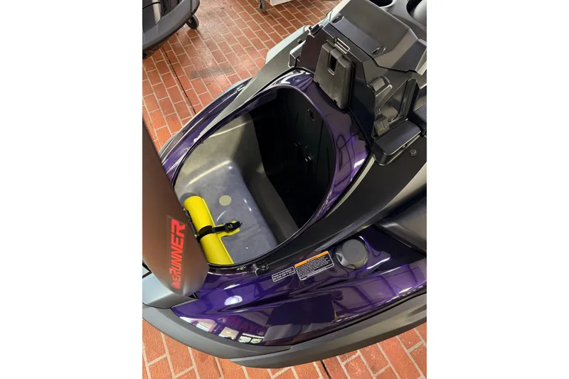 Slide: The Image of 2026 Yamaha WaveRunner FX SVHO storage compartment, open view on brick floor. - 13