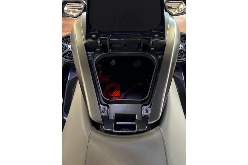 Slide: The Image of 2026 Yamaha WaveRunner FX SVHO storage compartment open, showcasing interior space. - 14
