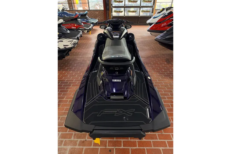 Slide: The Image of 2026 Yamaha WaveRunner FX SVHO in showroom, rear view on brick floor. - 3