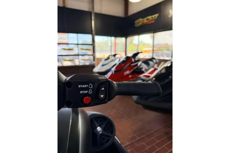 Slide: The Image of 2026 Yamaha WaveRunner FX SVHO handlebar with start and stop controls in showroom. - 6