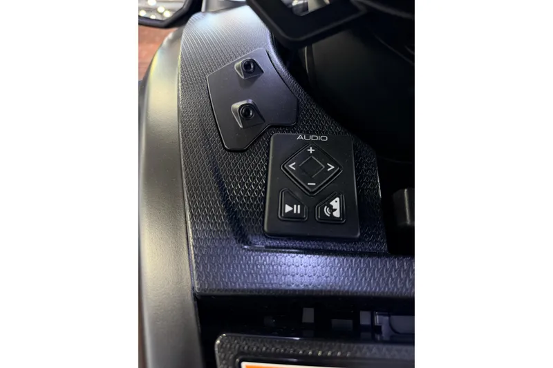 Slide: The Image of Close-up of 2026 Yamaha WaveRunner FX SVHO audio control panel. - 8