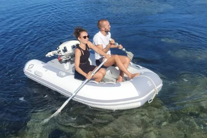 Slide: The Image of Manufacturer Provided Image: Two people rowing Zodiac Cadet 310 Aero inflatable boat. - 2