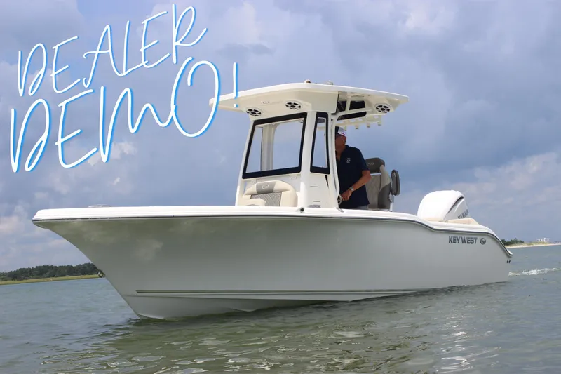 The Image of 2026 Key West 239 FS boat on water, labeled "Dealer Demo" under cloudy sky. - 0