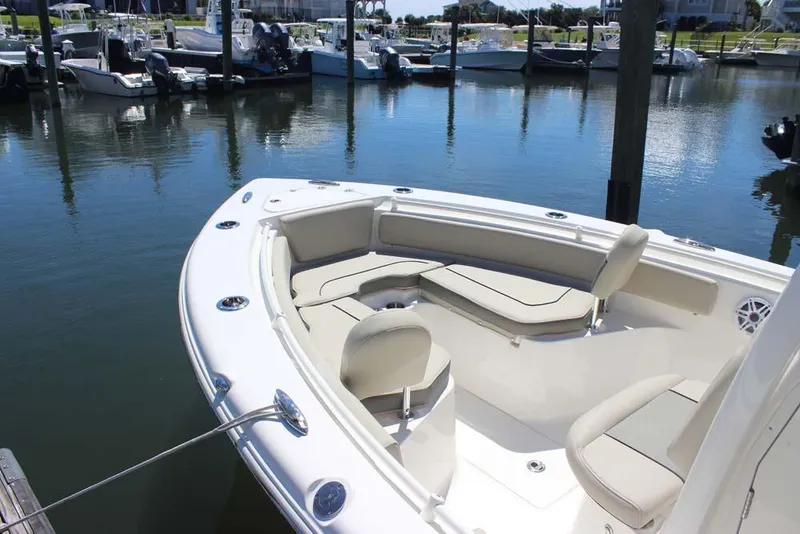Slide: The Image of 2026 Key West 239 FS boat with spacious seating at marina. - 7