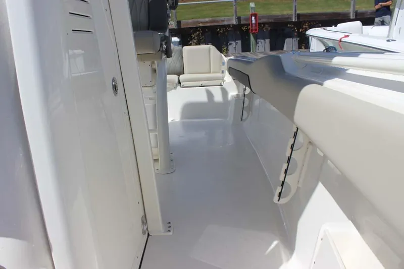 Slide: The Image of 2026 Key West 239 FS boat interior, showcasing sleek design and spacious seating area. - 17