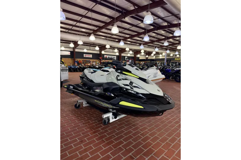 The Image of 2026 Yamaha WaveRunner VX Cruiser HO displayed in a showroom with brick flooring. - 1
