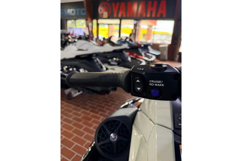 Slide: The Image of Handlebar controls of 2026 Yamaha WaveRunner VX Cruiser HO in showroom setting. - 7