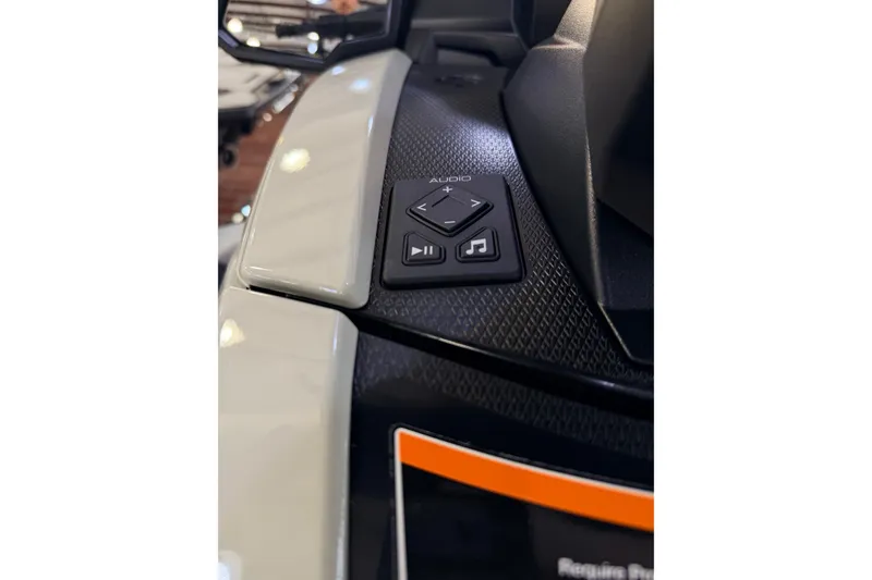 Slide: The Image of Close-up of 2026 Yamaha WaveRunner VX Cruiser HO audio controls. - 9