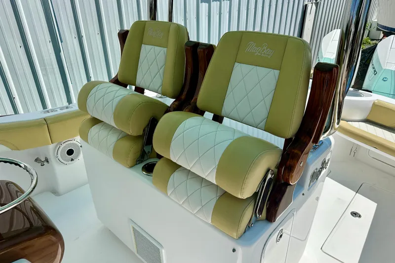 Slide: The Image of Luxury seating on 2020 Mag Bay 33 CC boat with elegant design and comfort. - 14