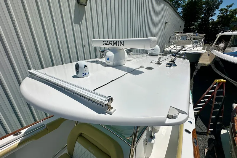 Slide: The Image of 2020 Mag Bay 33 CC boat with Garmin and FLIR equipment on deck. - 15