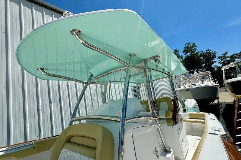 Slide: The Image of 2020 Mag Bay 33 CC boat with sleek design and modern features. - 16